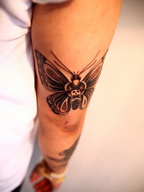 Upper Arm Realistic Butterfly Tattoo on skin