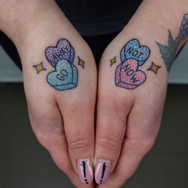 Bright and playful candy heart tattoo designs Tattoo on skin