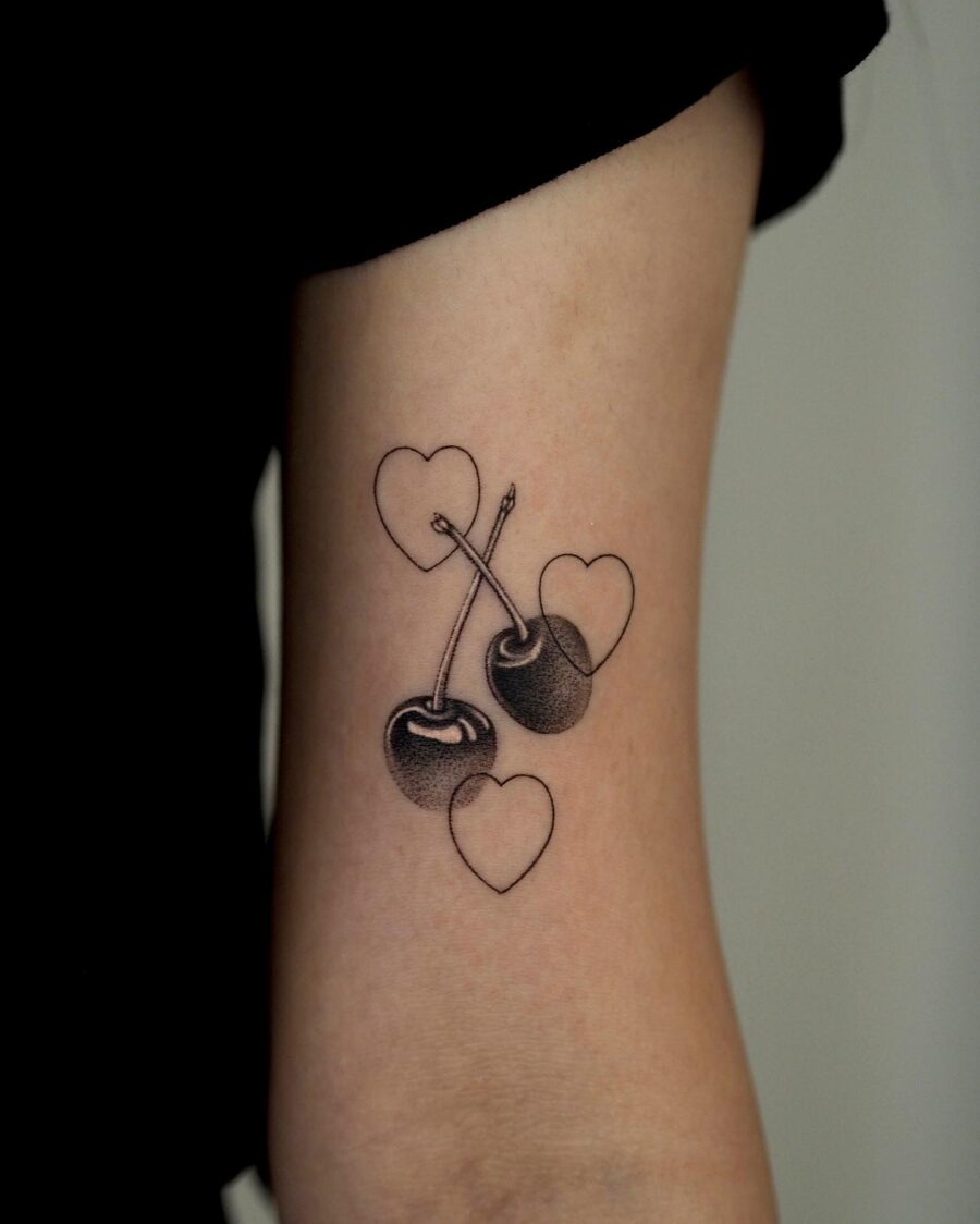 Charming cherry heart tattoo design inspiration Tattoo on skin