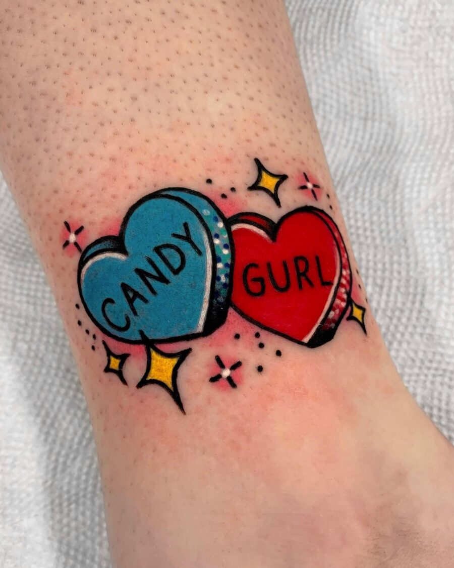 Colorful candy hearts tattoo with playful vibes Tattoo on skin