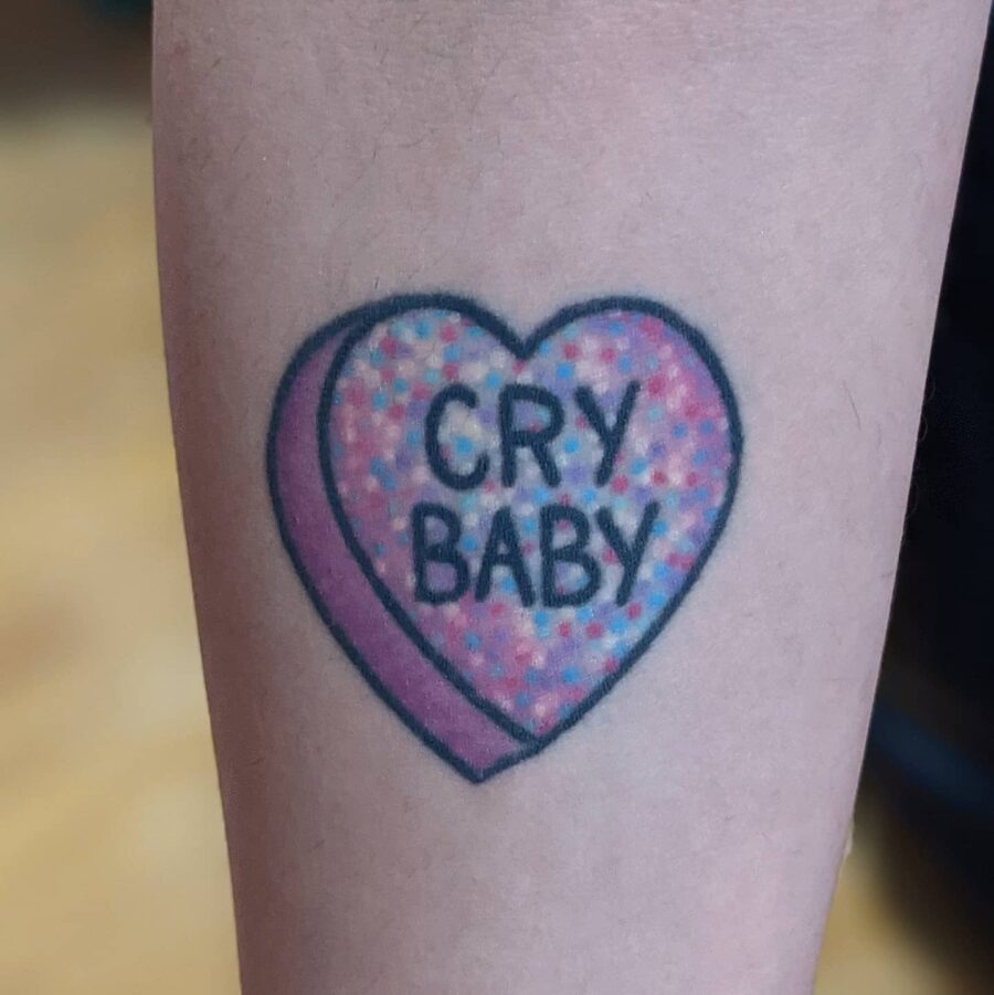 Cute and colorful candy heart tattoo design Tattoo on skin