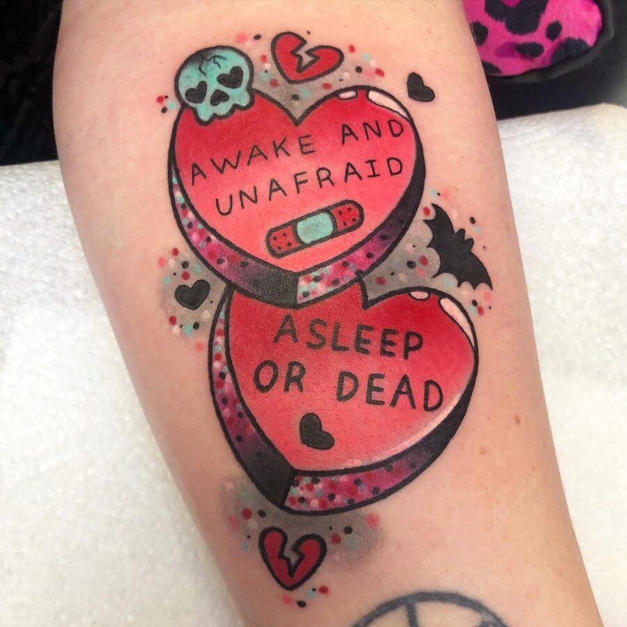 Playful yet edgy candy heart tattoo design Tattoo on skin