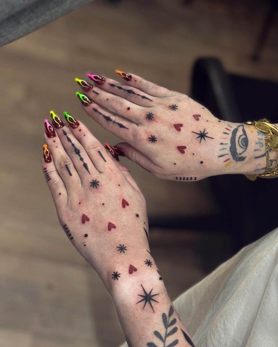 Vibrant Candy Heart Tattoos on Hands Tattoo on skin