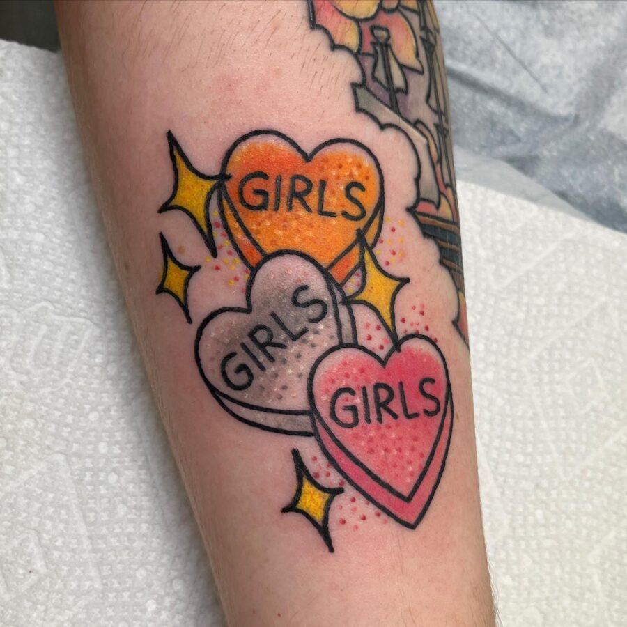 Vibrant candy heart tattoos with a playful vibe Tattoo on skin