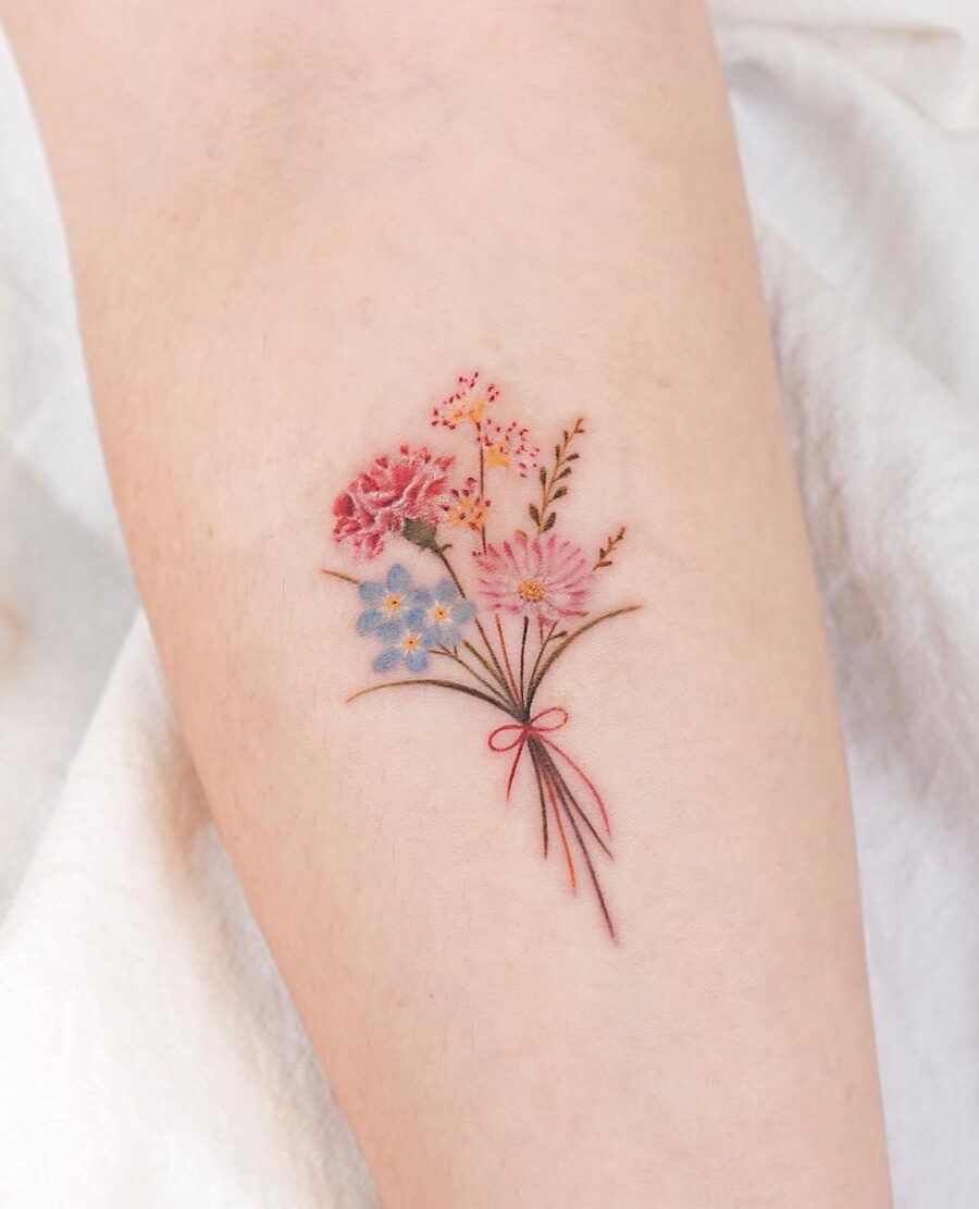 Charming bouquet of colorful carnation tattoos Tattoo on skin