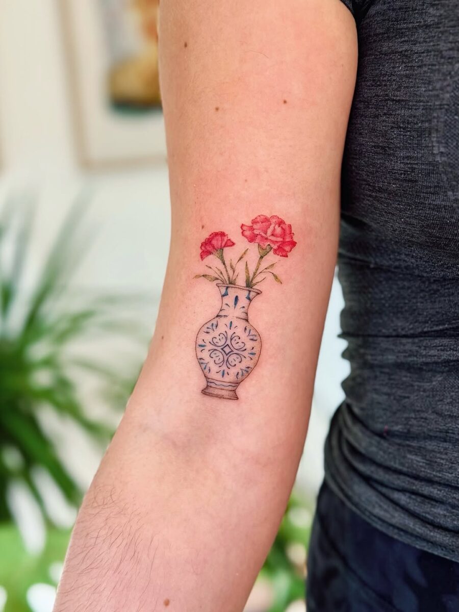 Charming carnation vase tattoo on arm Tattoo on skin