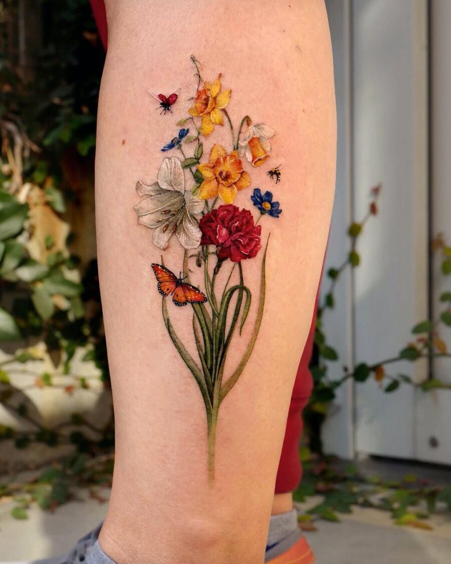 Colorful carnation tattoo with delicate floral details Tattoo on skin