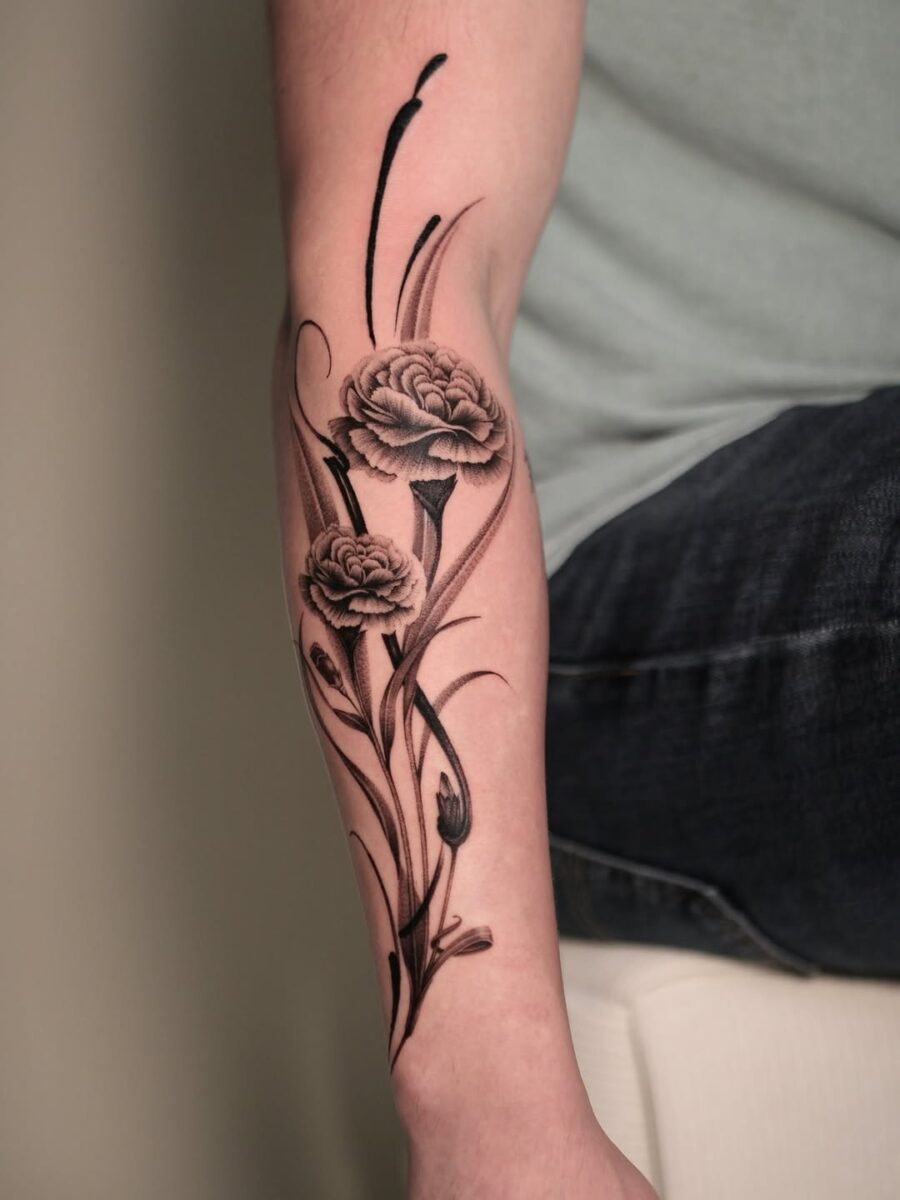 Elaborate black ink carnation tattoo design Tattoo on skin