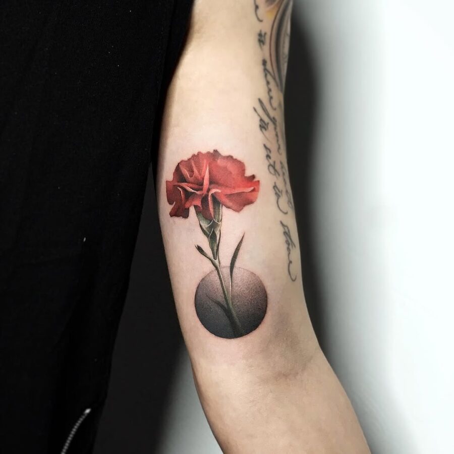 Elegant carnation tattoo with vivid shading Tattoo on skin