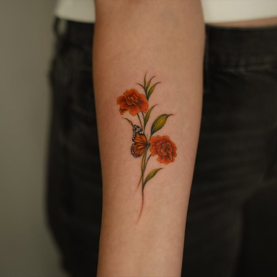 Vibrant Carnation Tattoo with Butterfly Tattoo on skin
