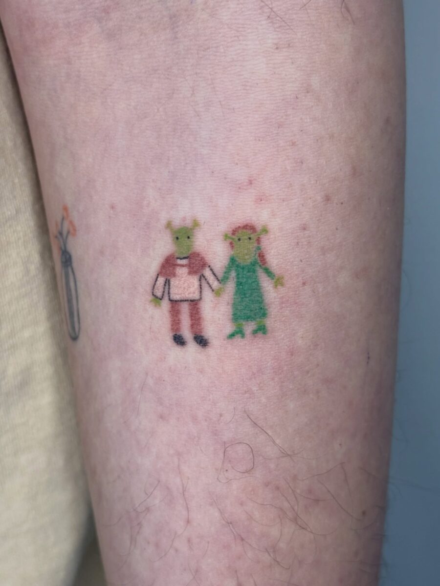 Adorable Shrek and Fiona cartoon tattoo design Tattoo on skin