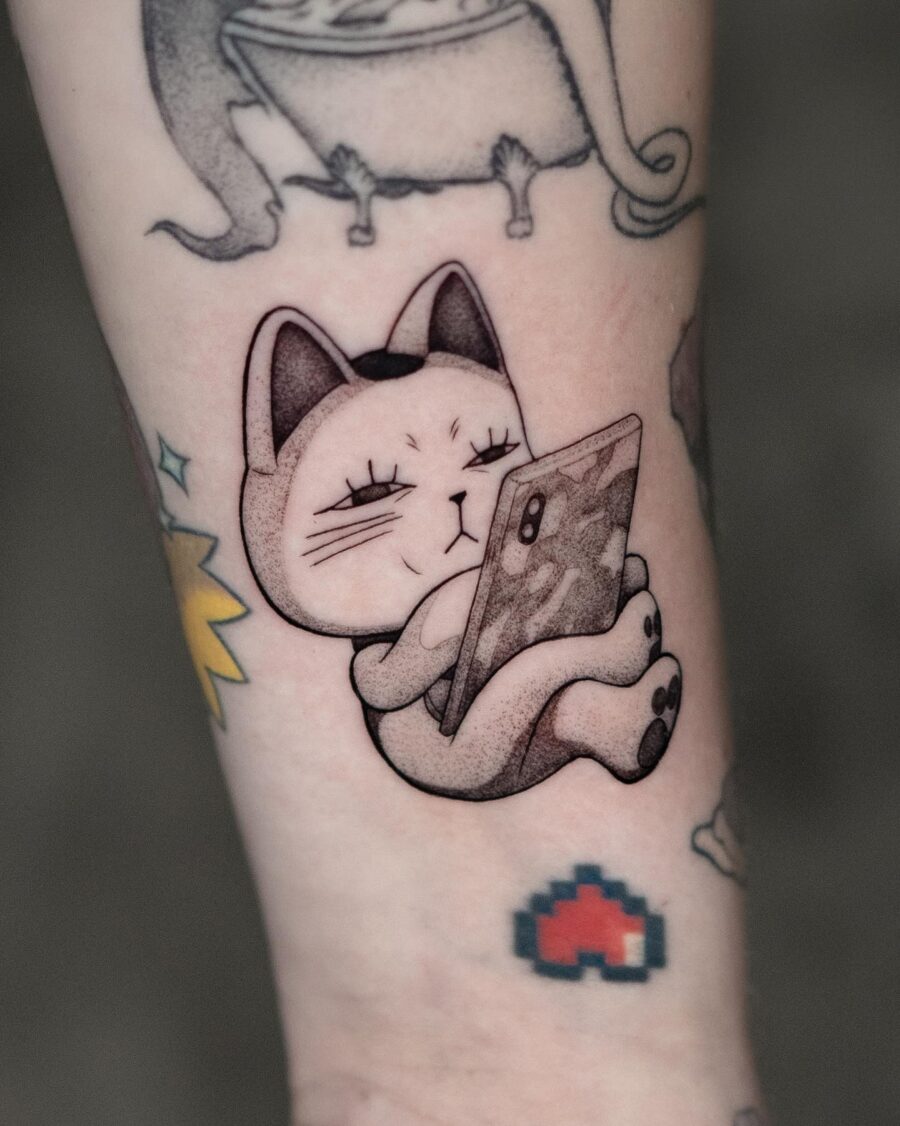Charming Cat Tattoo with a Playful Vibe Tattoo on skin