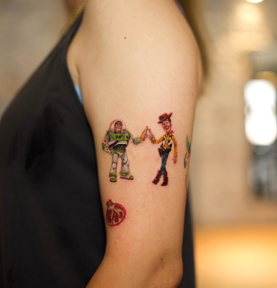 Colorful cartoon tattoos of iconic characters Tattoo on skin
