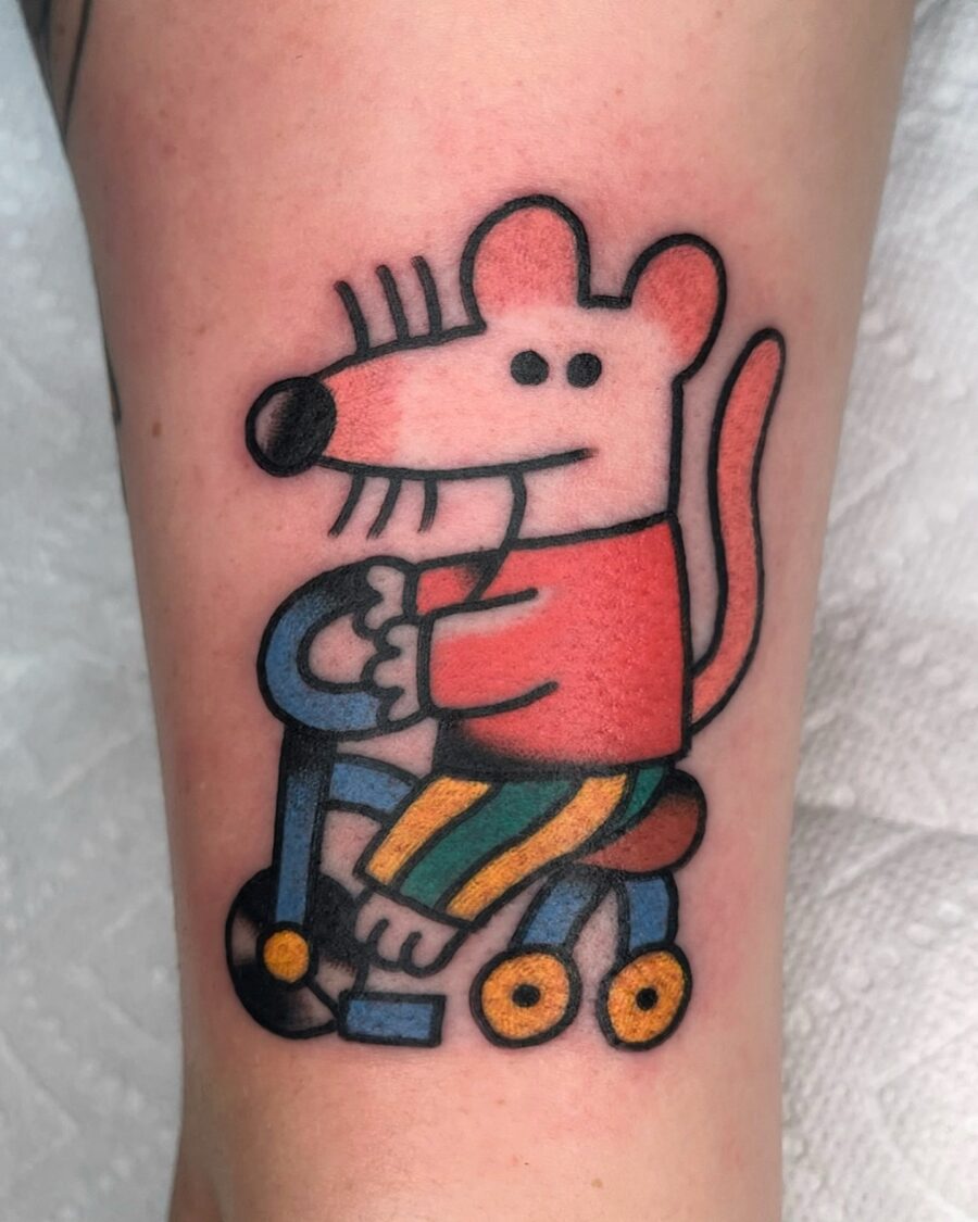 Whimsical cartoon tattoo with a playful mouse Tattoo on skin