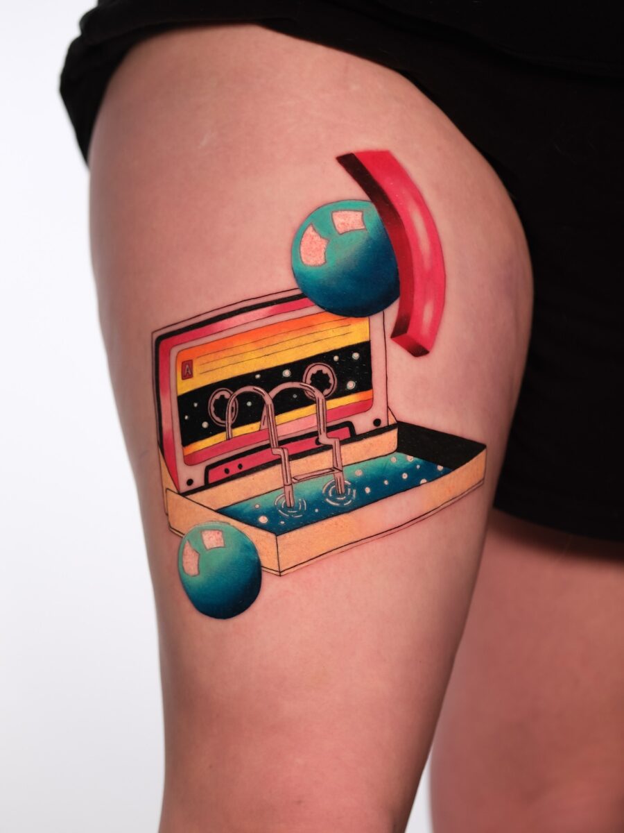 Colorful cassette tape tattoo with retro vibes Tattoo on skin