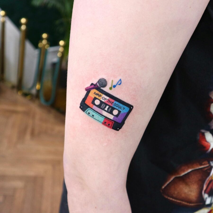 Colorful cassette tattoo capturing musical nostalgia Tattoo on skin