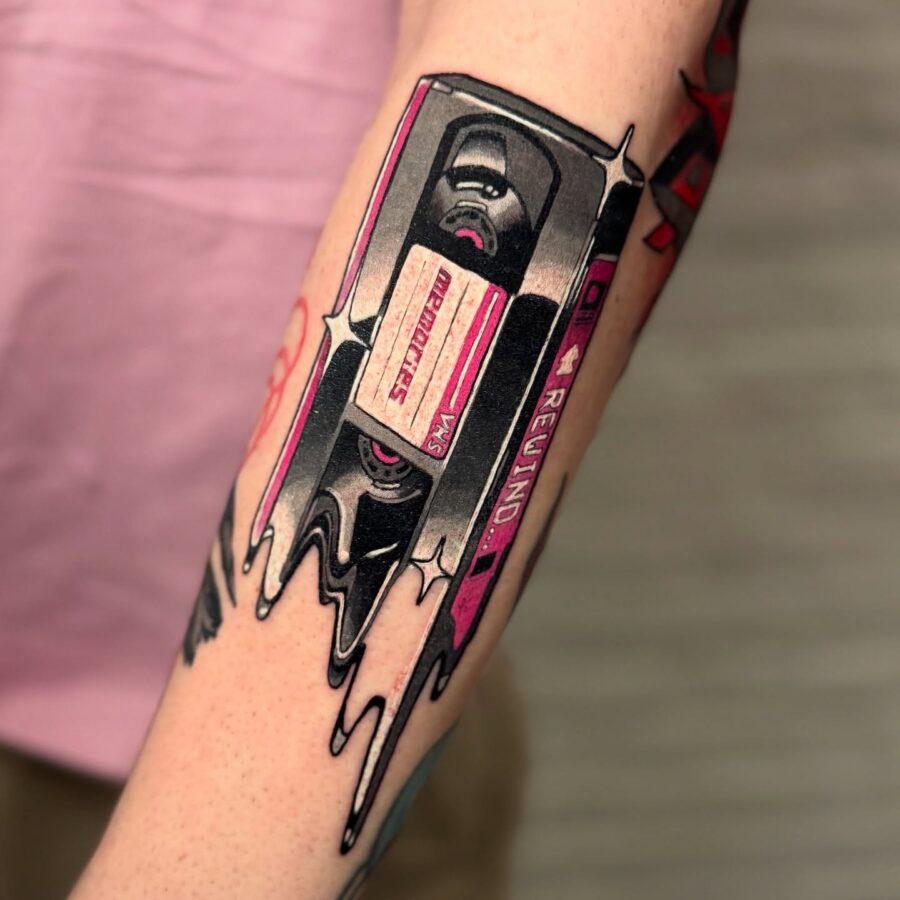 Vintage cassette tape tattoo with vibrant colors Tattoo on skin