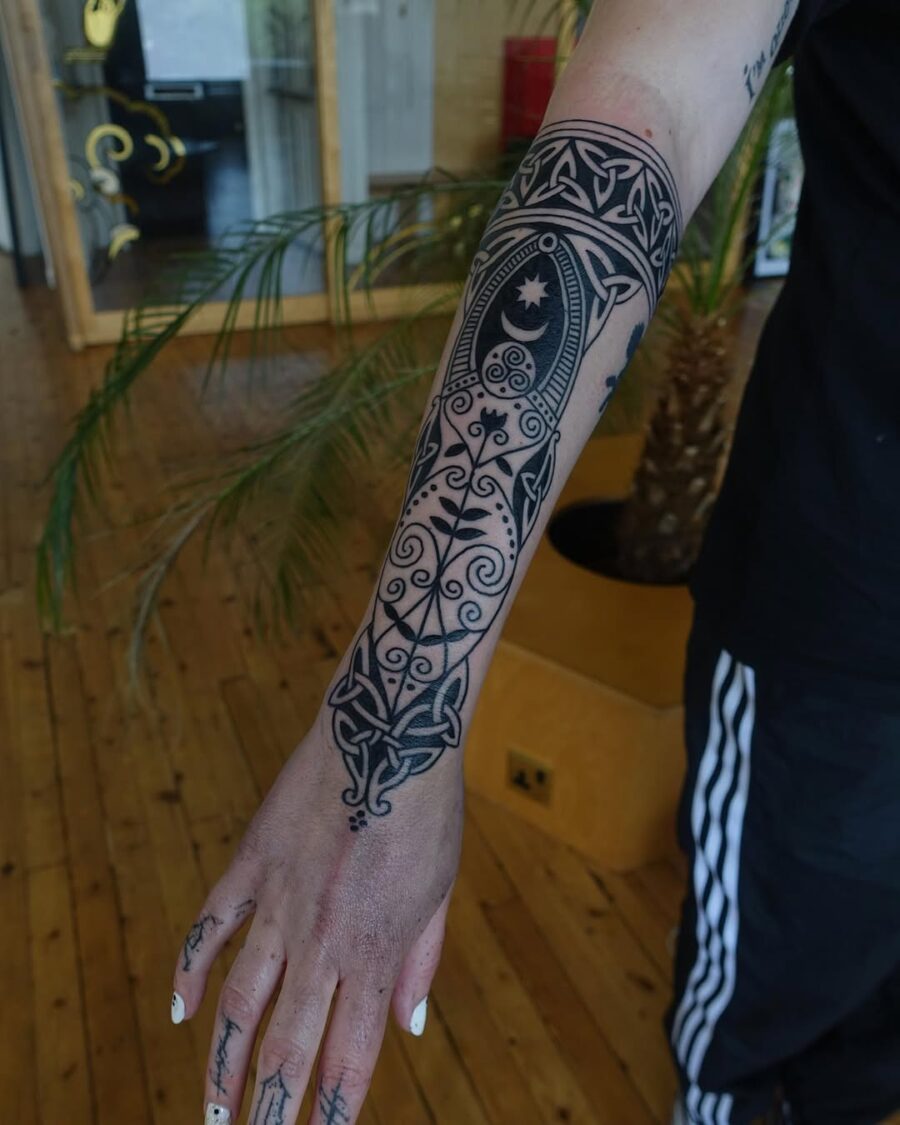 Elegant Celtic tattoo with intricate designs Tattoo on skin