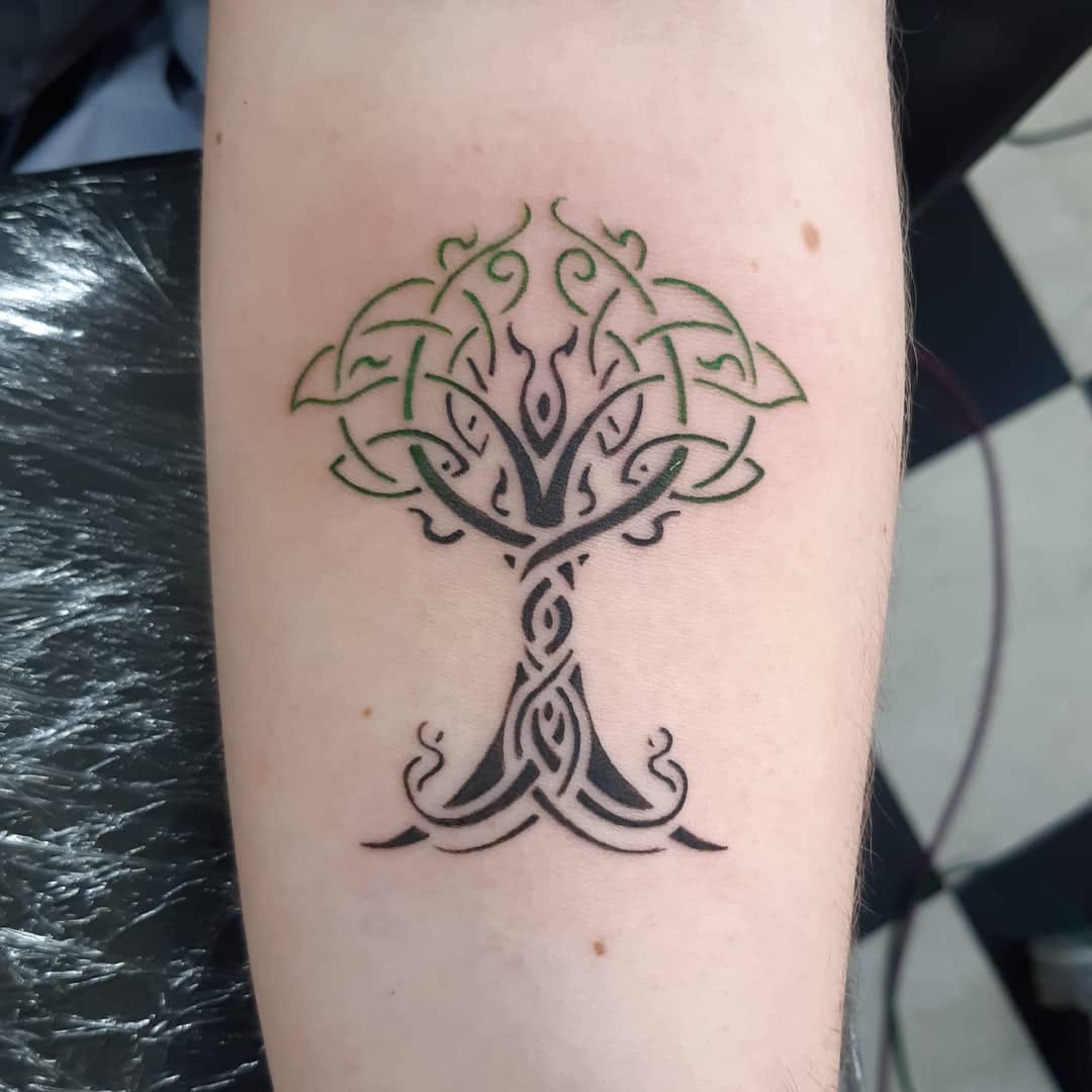 Elegant Celtic Tree Tattoo Design Captured on Skin Tattoo on skin