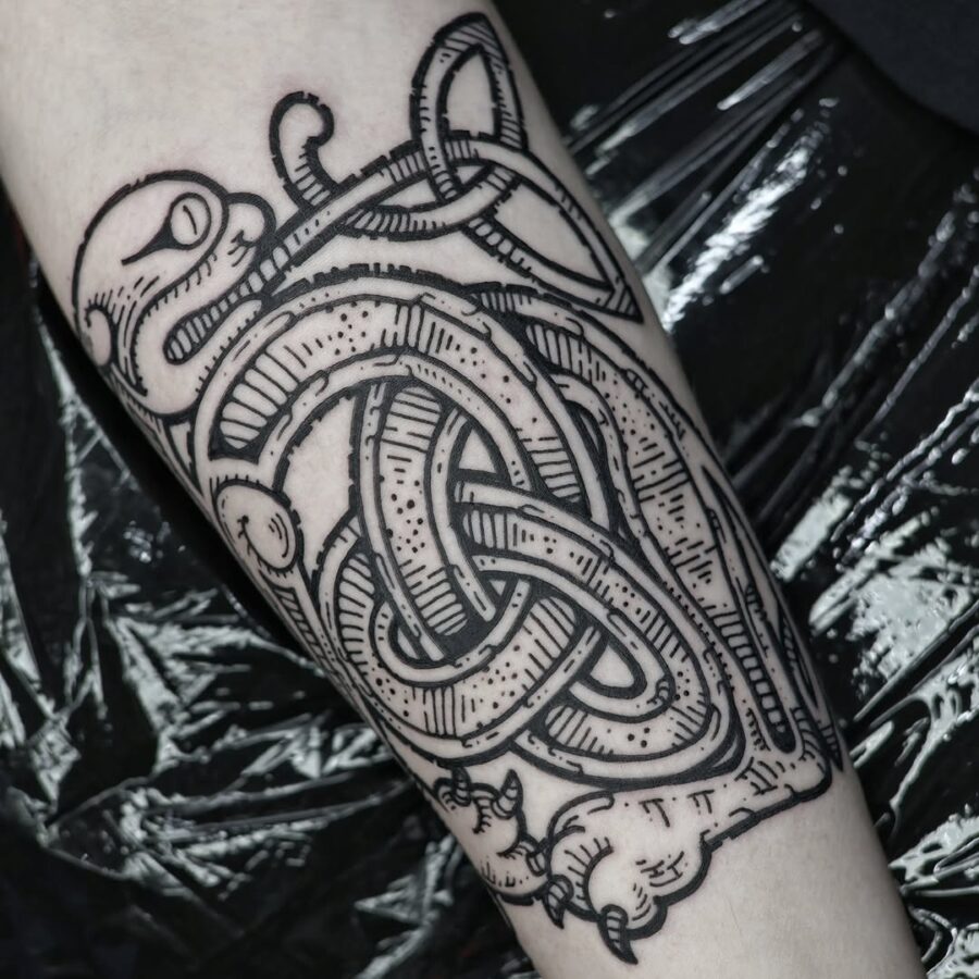 Intricate black ink Celtic knot tattoo design Tattoo on skin