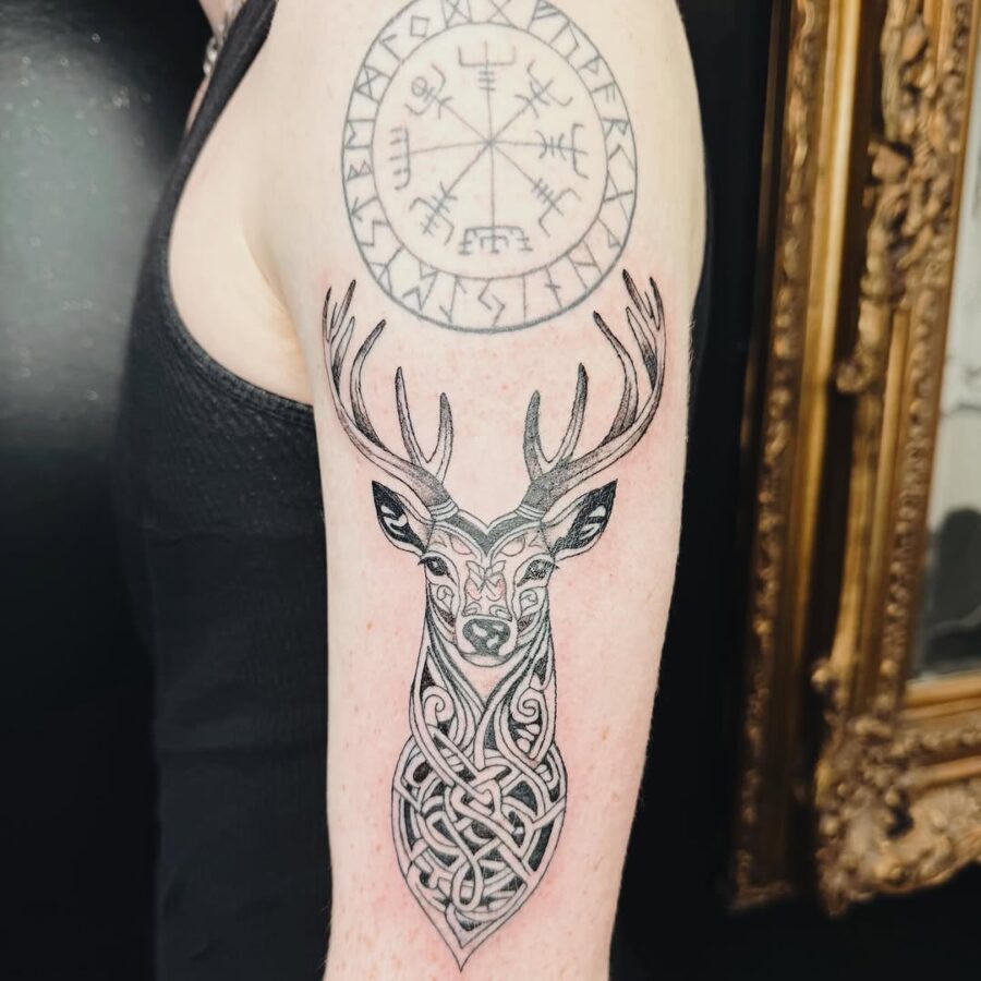 Intricate Celtic deer tattoo representing strength and wisdom Tattoo on skin
