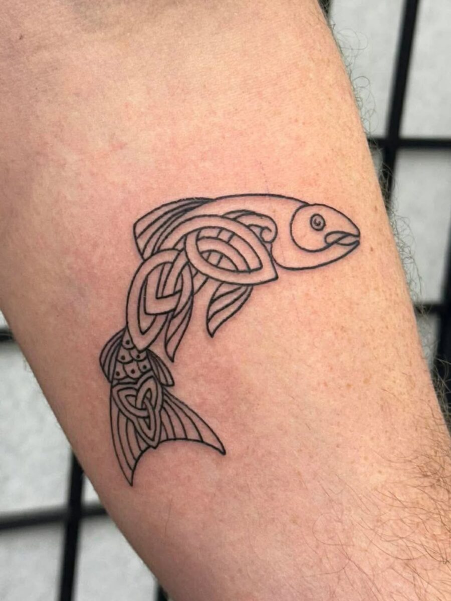 Intricate Celtic fish tattoo design in black ink celtic tattoos