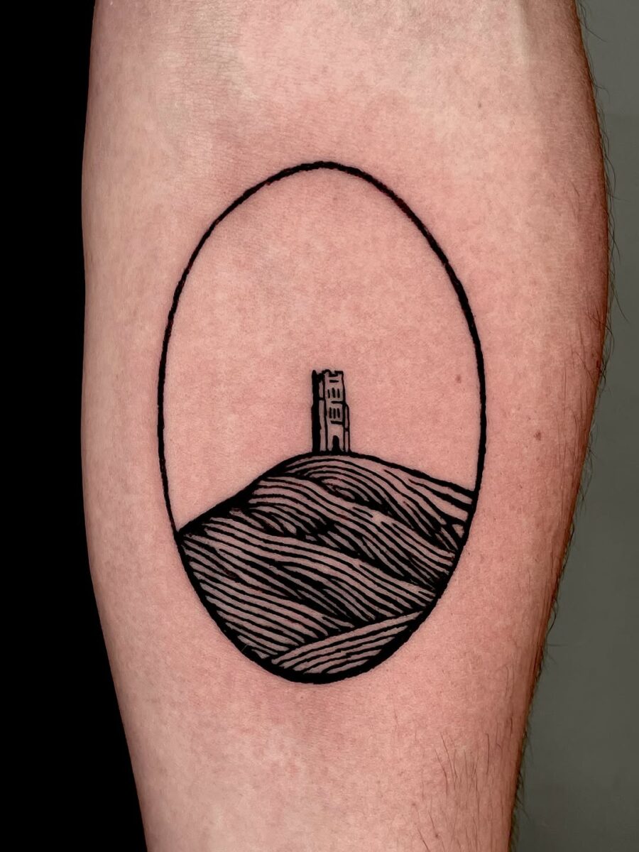 Minimalist Celtic tower tattoo capturing heritage Tattoo on skin