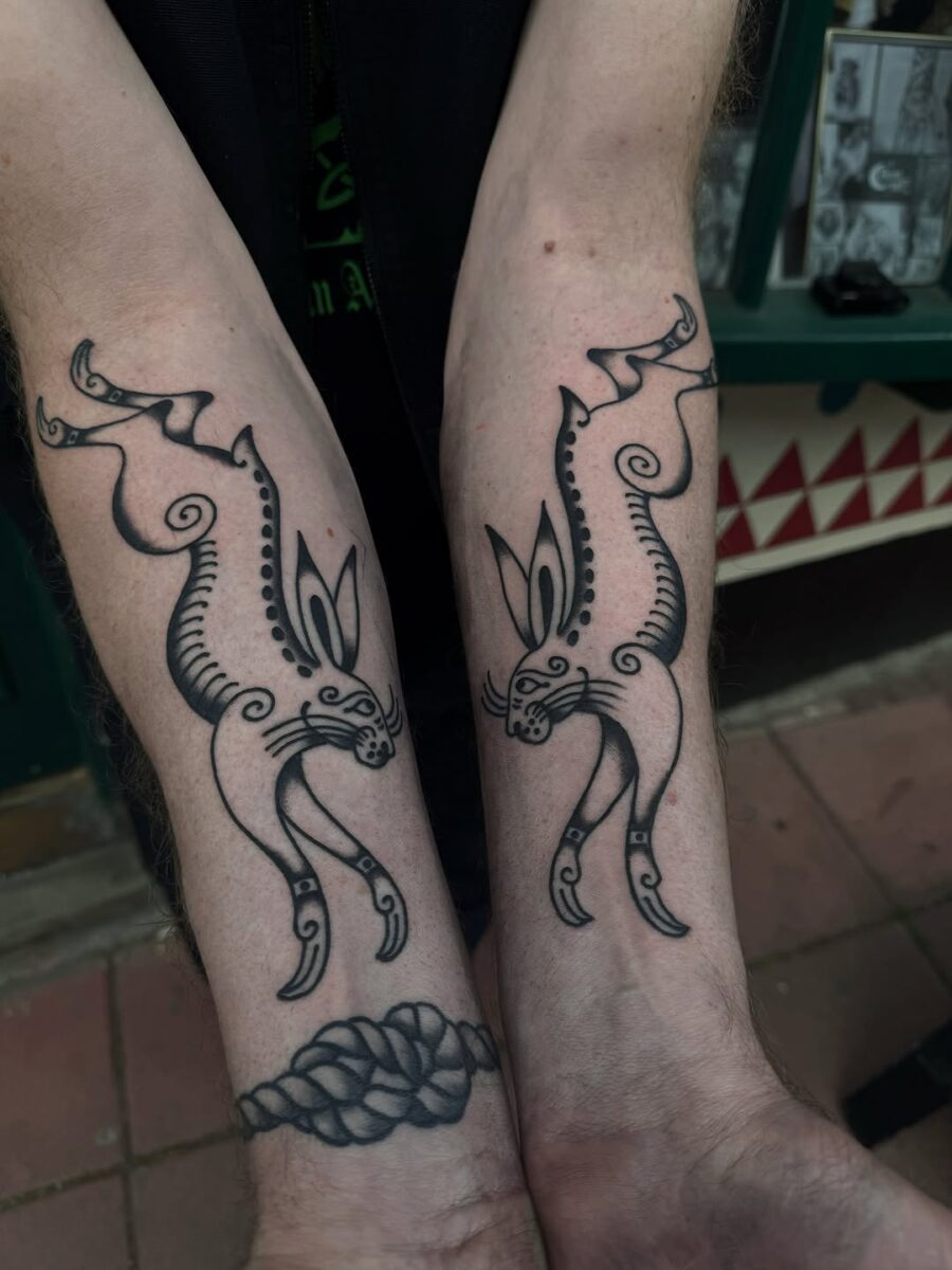 Unique rabbit designs featuring intricate swirls Tattoo on skin