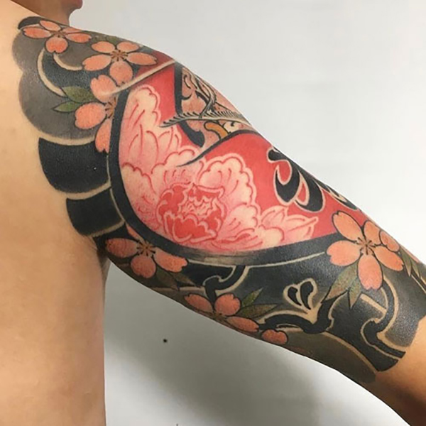 The Bright, Blossom-Centric Half Sleeve Cherry Blossom Tattoo Designs Tattoo on skin