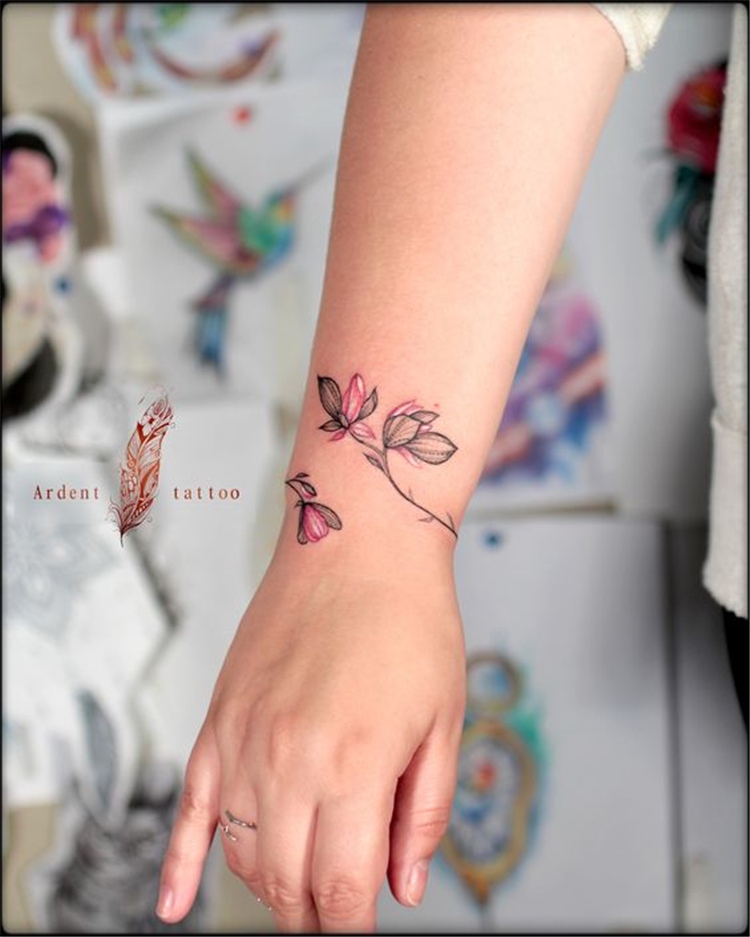 The Delicate Cherry Blossom Wrist Tattoo Tattoo on skin