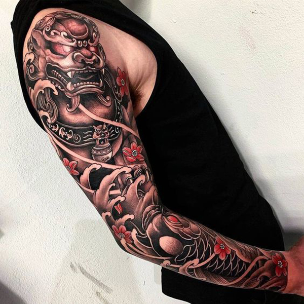 The Menacing Dragon and Koi Tattoo on skin