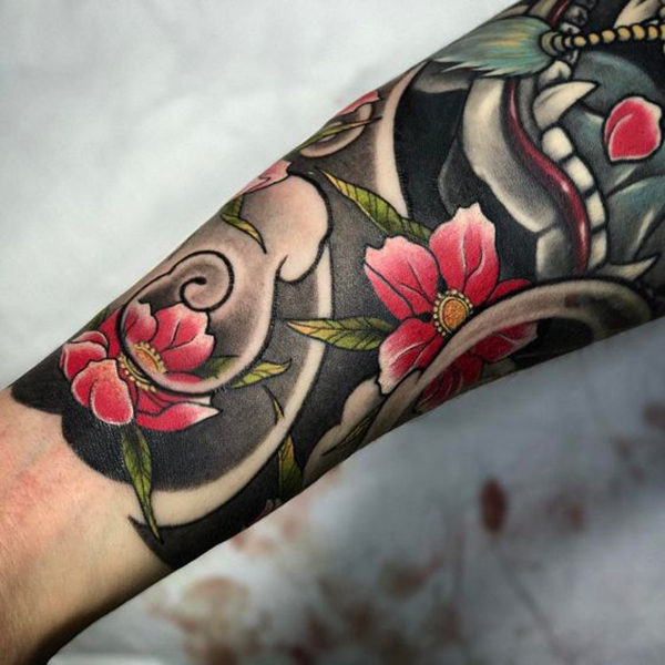 The Old-Style Flowers with Dragon Tattoo on skin