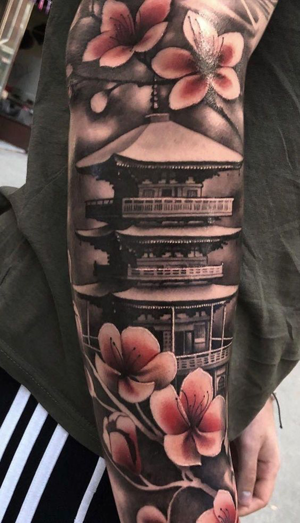 The Peaceful Pagoda With Cherry Blossom Tattoo on skin