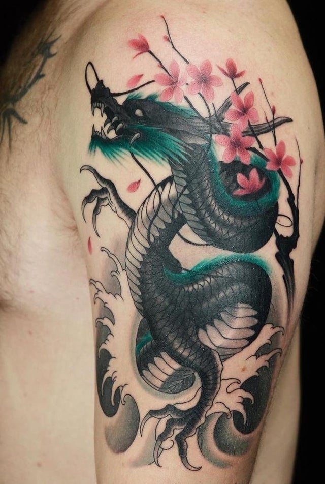 The Wave-Riding, Bold Dragon Tattoo on skin