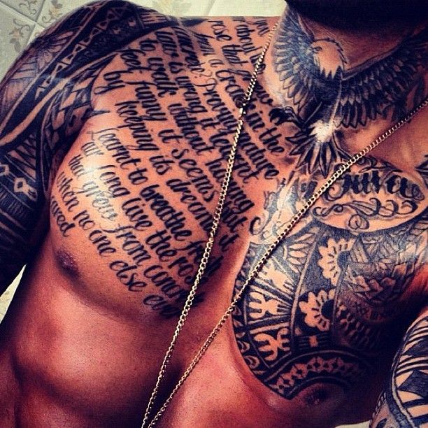 Script and Tribal Chest Tattoo Tattoo on skin