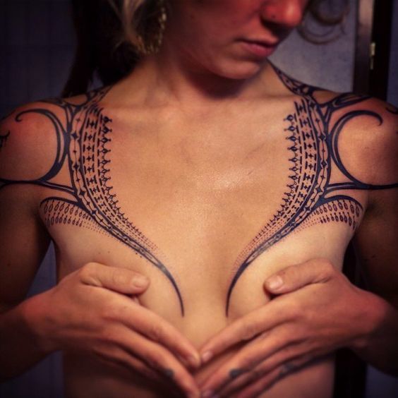 Sexy Curvy Shoulder-to-Chest Tattoo Tattoo on skin