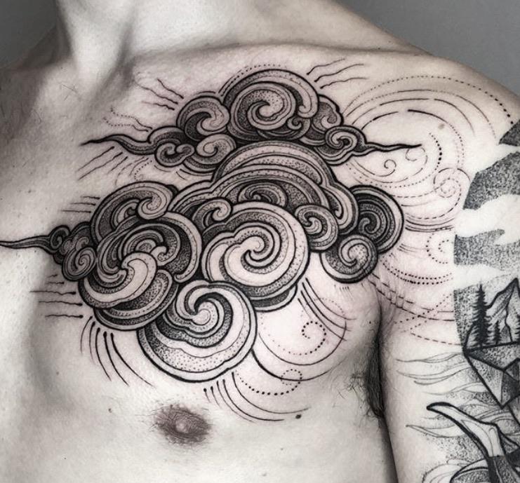 Black and White Swirling Clouds Chest Tattoo Tattoo on skin