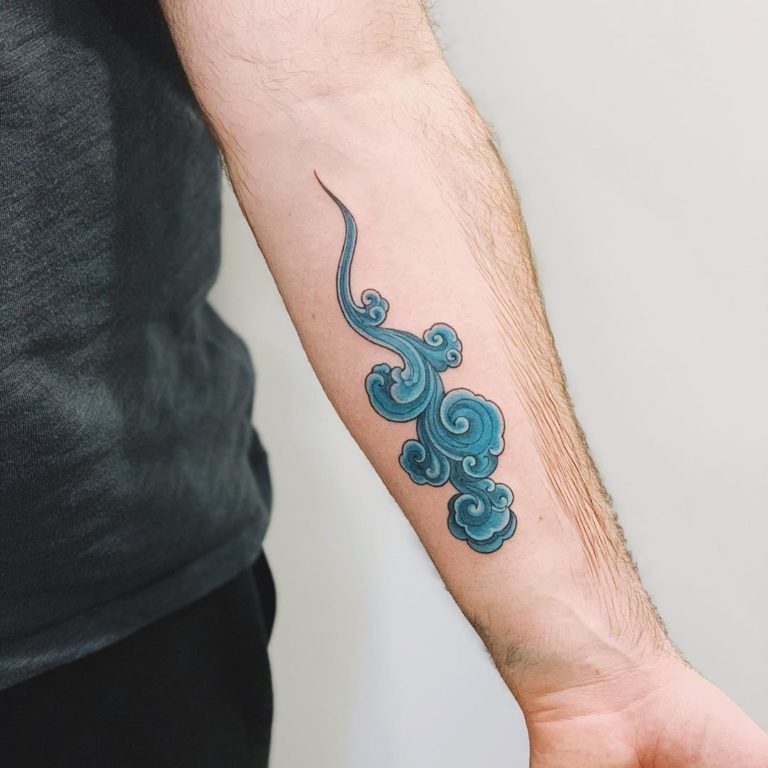 Blue Billow of Cloud Tattoos on Arm Tattoo on skin