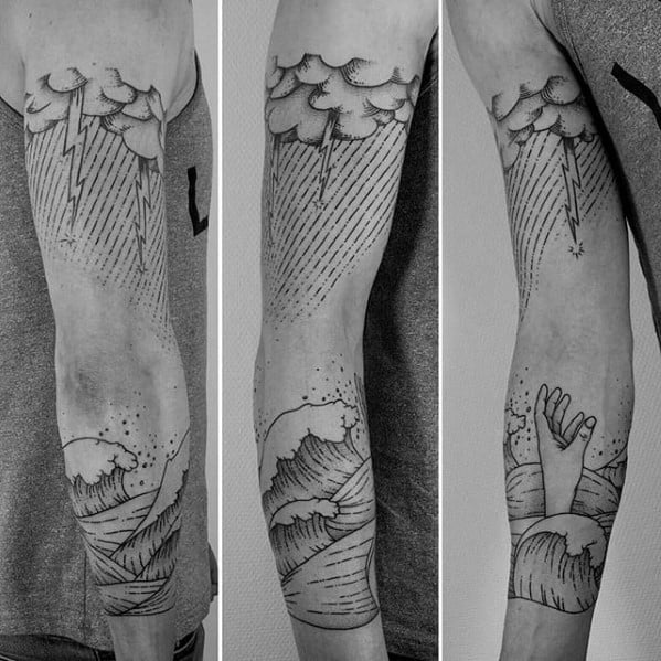 Clouds, Lightning, and Waves with Hand Tattoo Tattoo on skin