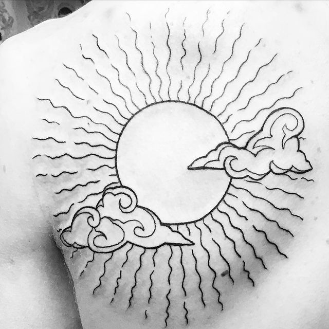 Large Sun with Clouds OutlineTattoo Tattoo on skin