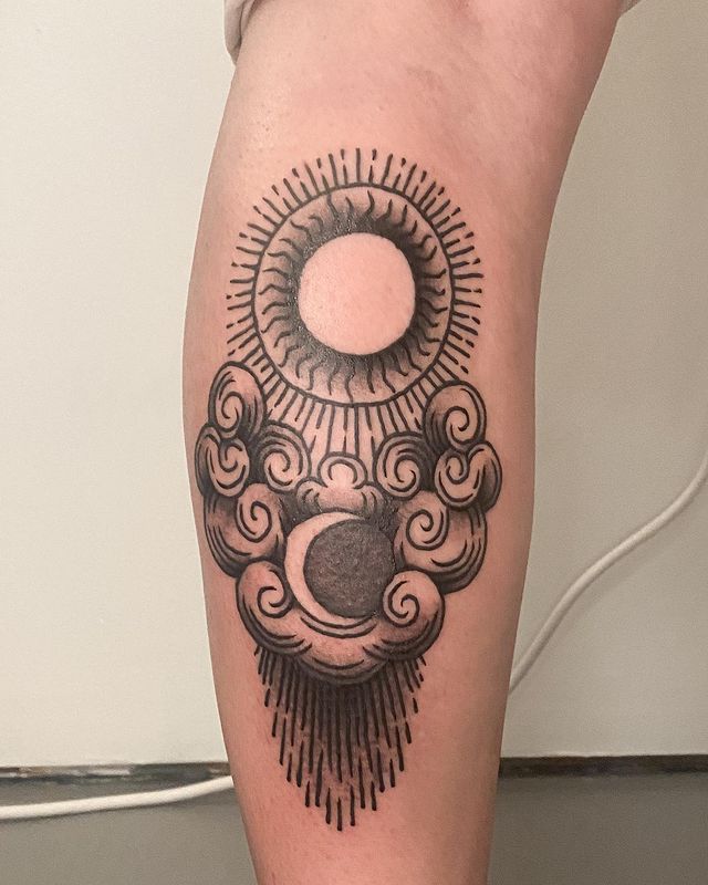 Tattoo Picture of Sun, Moon, and Clouds Tribal Tattoo Tattoo on skin