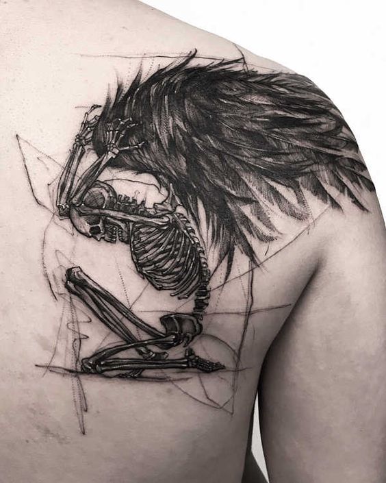 Dark Fantasy Feathered Skeleton Angel Tattoo on skin
