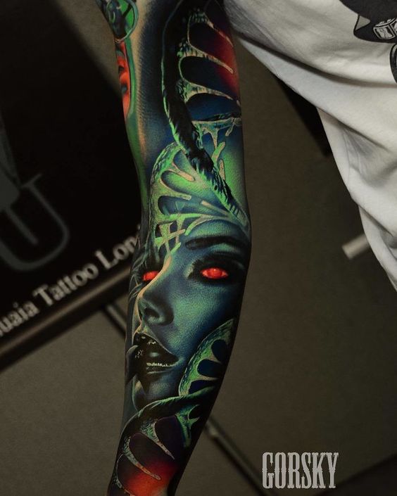 Glow in the Dark Alien Goddess Tattoo on skin