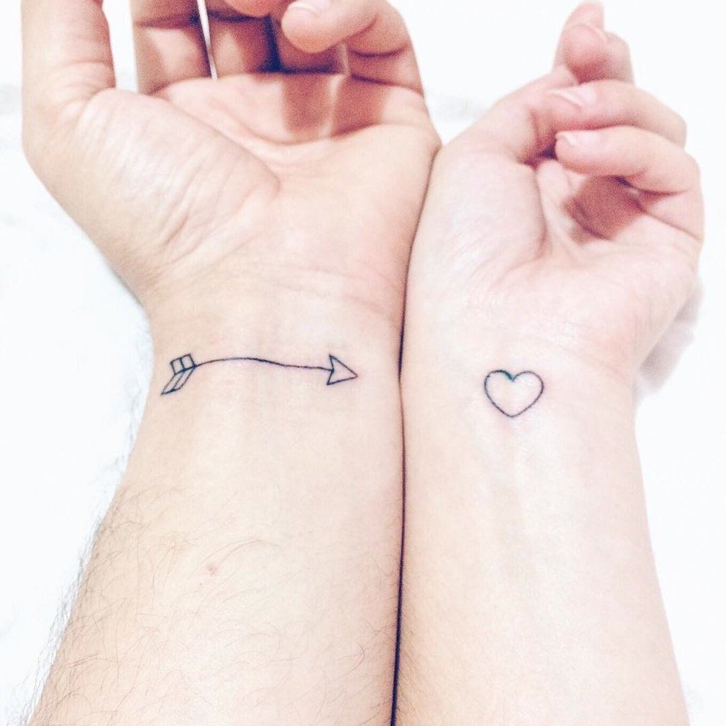 Arrow and Heart Wrist Couple Tattoo Tattoo on skin