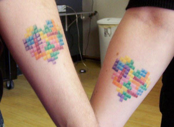 Colorful Pixel Couple Heart Tattoo Tattoo on skin