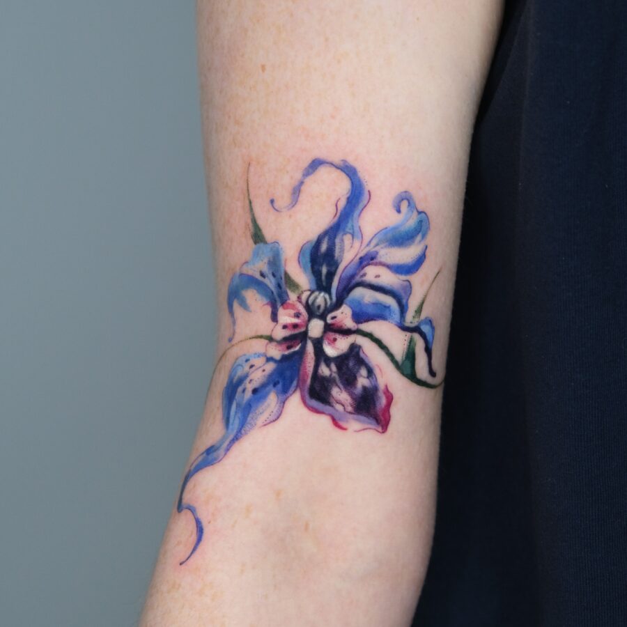 Beautiful floral cover up tattoo on arm Tattoo on skin