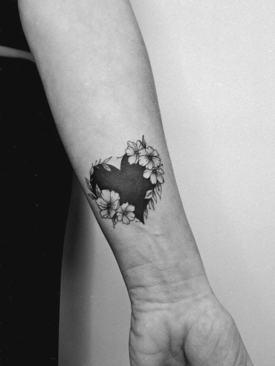 Beautiful floral heart cover-up tattoo design Tattoo on skin