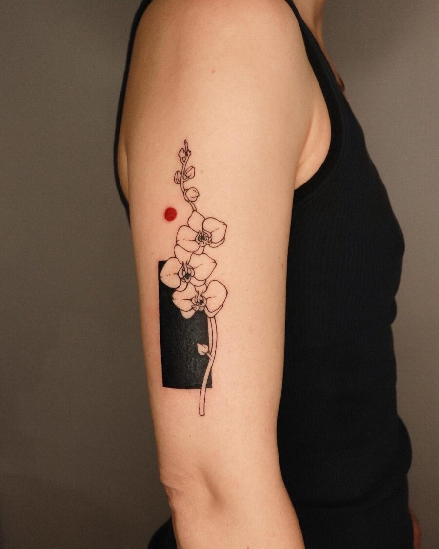 Elegant Floral Tattoo with Bold Geometry Tattoo on skin