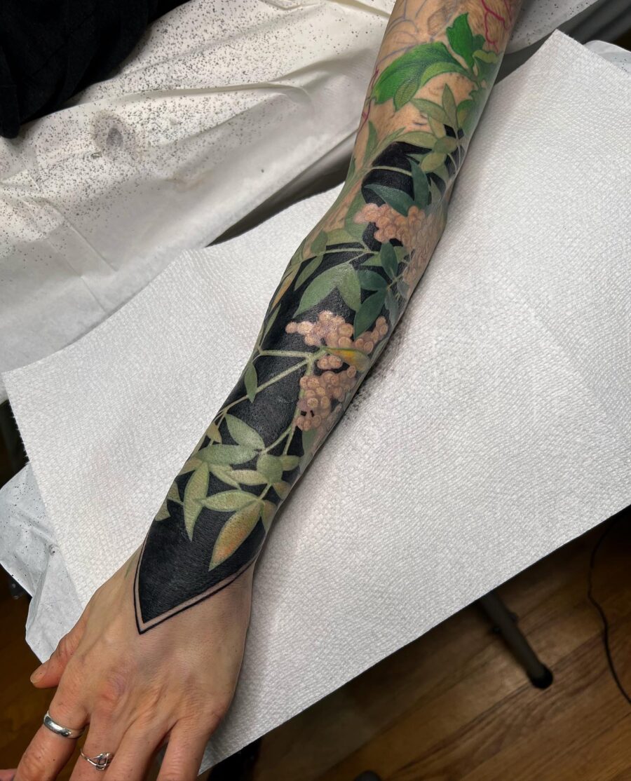 Stunning floral cover-up tattoo on forearm Tattoo on skin