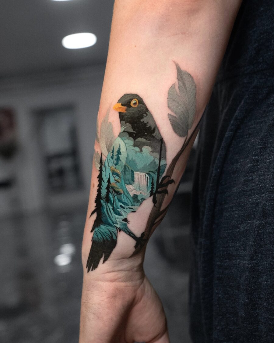 Vibrant bird with nature scene tattoo cover up tattoos